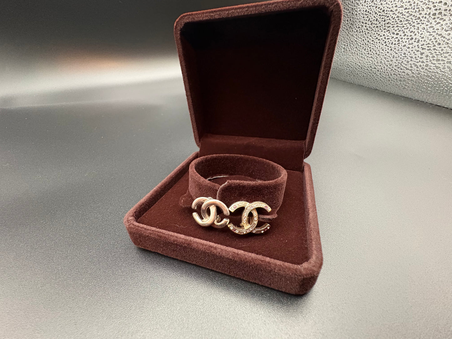 Chanel mismatched earrings
